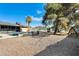 Spacious backyard with gravel and play area at 1437 W Yukon Dr, Phoenix, AZ 85027