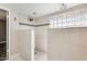 Modern bathroom with a walk-in shower and glass block window at 1437 W Yukon Dr, Phoenix, AZ 85027