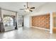 Bright living room featuring tile floors and an accent wall at 1437 W Yukon Dr, Phoenix, AZ 85027