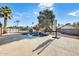 Sparkling pool with waterfall feature and patio at 1437 W Yukon Dr, Phoenix, AZ 85027