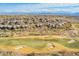 Community overview, showing homes surrounding a golf course at 16333 E Lombard Pl, Fountain Hills, AZ 85268