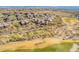 Aerial view of community near golf course with desert landscape at 16333 E Lombard Pl, Fountain Hills, AZ 85268