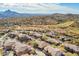 Aerial view of community with mountain views and golf course at 16333 E Lombard Pl, Fountain Hills, AZ 85268