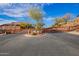 Community entrance with custom iron gates and landscaping at 16333 E Lombard Pl, Fountain Hills, AZ 85268