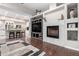 Living room with built-in entertainment center and fireplace at 16333 E Lombard Pl, Fountain Hills, AZ 85268