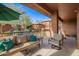 Outdoor patio with seating and a view of the surrounding landscape at 16333 E Lombard Pl, Fountain Hills, AZ 85268