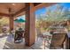 Spacious covered patio with comfortable seating and views of the community at 16333 E Lombard Pl, Fountain Hills, AZ 85268