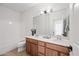 Double vanity bathroom with large mirror and shower/tub combo at 1702 E Bell Rd # 130, Phoenix, AZ 85022