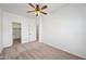 Bright bedroom with ceiling fan and spacious closet at 1702 E Bell Rd # 130, Phoenix, AZ 85022