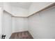 Large walk-in closet with double hanging rods at 1702 E Bell Rd # 130, Phoenix, AZ 85022