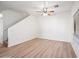 Spacious living room with wood-look floors at 1702 E Bell Rd # 130, Phoenix, AZ 85022