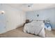 Bedroom with queen bed, ceiling fan, and large closet at 18003 N 136Th Way, Sun City West, AZ 85375