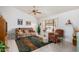 Living room with tiled floor, seating area and southwestern decor at 18003 N 136Th Way, Sun City West, AZ 85375