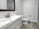 Clean bathroom, featuring a white vanity and shower at 2028 E Lipizzan Dr, San Tan Valley, AZ 85140