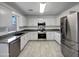 Modern kitchen with stainless steel appliances and granite countertops at 2028 E Lipizzan Dr, San Tan Valley, AZ 85140