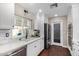 Updated kitchen featuring white shaker cabinets, a large sink, and stainless steel appliances at 2032 E Pegasus Dr, Tempe, AZ 85283