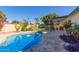 Stunning pool with surrounding patio and lush landscaping at 2032 E Pegasus Dr, Tempe, AZ 85283