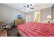 Spacious bedroom with wood flooring and ceiling fan at 20587 N 259Th Dr, Buckeye, AZ 85396