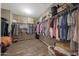 Large walk-in closet with ample hanging space at 20587 N 259Th Dr, Buckeye, AZ 85396