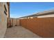 Side yard with storage shed and wheelbarrow at 20587 N 259Th Dr, Buckeye, AZ 85396