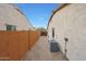 Side yard with AC unit and access gate at 20587 N 259Th Dr, Buckeye, AZ 85396