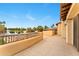 Outdoor balcony overlooking a lake with wrought iron railing at 21 E Oakwood Hills Dr, Chandler, AZ 85248