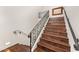 Staircase with decorative iron railing leading to the upper level at 21 E Oakwood Hills Dr, Chandler, AZ 85248