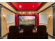 Home theater with a large screen and comfortable seating, perfect for movie nights at 21 E Oakwood Hills Dr, Chandler, AZ 85248