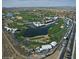 Aerial view of a golf course with spectators and tents at 21215 N 75Th St, Scottsdale, AZ 85255