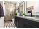 Modern bathroom with double vanity and large walk-in shower at 21215 N 75Th St, Scottsdale, AZ 85255