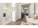 Spa-like bathroom with a large soaking tub and double vanity at 21215 N 75Th St, Scottsdale, AZ 85255