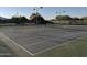 Clean tennis court ready for a match at 21215 N 75Th St, Scottsdale, AZ 85255