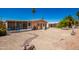 Landscaped backyard with gravel and desert plants at 2400 E Baseline Ave # 84, Apache Junction, AZ 85119