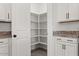 Kitchen pantry features functional shelving with easy access to supplies at 26706 N 174Th Ln, Surprise, AZ 85387