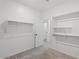 Spacious walk-in closet featuring built-in shelving and ample storage space at 26706 N 174Th Ln, Surprise, AZ 85387