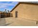 A gated entrance leads to the back of the property where you'll find a secure doorway at 3000 E Tulsa St, Gilbert, AZ 85295