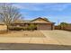 Charming single-story home featuring a desert-landscaped front yard and a spacious two-car garage at 3000 E Tulsa St, Gilbert, AZ 85295