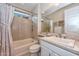 Bright bathroom featuring marble accents, a bathtub, and a shower at 30343 N 130Th Dr, Peoria, AZ 85383