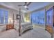 Bedroom with carpet, plantation shutters, and warm lighting at 30343 N 130Th Dr, Peoria, AZ 85383