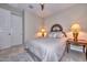 Comfortable bedroom featuring neutral tones and two side tables at 30343 N 130Th Dr, Peoria, AZ 85383