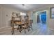 Formal dining room featuring a wooden table and decorative furnishings at 30343 N 130Th Dr, Peoria, AZ 85383