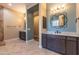 Spa-like bathroom with dual sinks and large mirrors at 31689 N 128Th Dr, Peoria, AZ 85383