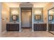 Elegant double vanity bathroom with granite counters at 31689 N 128Th Dr, Peoria, AZ 85383