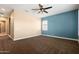 Bright bedroom featuring neutral walls and carpet at 31689 N 128Th Dr, Peoria, AZ 85383