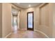 Bright entryway with tiled floors and a decorative door at 31689 N 128Th Dr, Peoria, AZ 85383