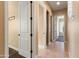 Interior hallway with neutral-toned walls and carpet at 31689 N 128Th Dr, Peoria, AZ 85383