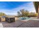 Outdoor kitchen with grill and prep area at 31689 N 128Th Dr, Peoria, AZ 85383