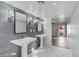 Elegant bathroom with double sinks and gray tile at 3174 E Marlette Ave, Phoenix, AZ 85016