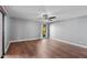 Bedroom with wood-look floors, ceiling fan and window at 3174 E Marlette Ave, Phoenix, AZ 85016