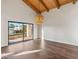 Bright dining room with hardwood floors, high ceilings, and sliding glass doors to patio at 3174 E Marlette Ave, Phoenix, AZ 85016